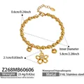 Detailed view of gold-plated stainless steel beaded bracelet with flower zircon charm - Gold Flower Heart Bangle (Z268)