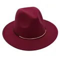 Detailed view of a burgundy wool felt fedora featuring an elegant black and gold band - M (56-58cm) / Burgundy