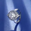 Detailed close-up of a 1-carat carbon diamond sunburst halo wedding ring - Ljz-72 [3 Carats] / Adjustable Open