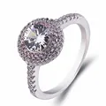 Elegant silver-toned halo ring featuring a brilliant clear center and pink stones. - Ljz-22 [1 Carat] / Adjustable Open