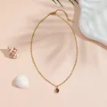 Elegant gold titanium steel necklace with an oval purple glass pendant for women. - Titanium Steel Necklace