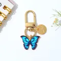 Betoverende blauwe emaille vlinder sleutelhanger met gouden Love bedel voor tassen - Blauw Gradiëntstijl (C)