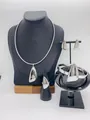 Full detailed view of elegant silver stainless steel jewelry set with necklace and ring - Irregular Waterdrop Mirror Silver (LX010019 Steel)