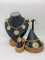 Elegant gold-plated stainless steel jewelry set featuring hollow circular patterns - Round Hollow Swirl Rhinestone Style (LX010034)