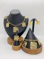 Elegant golden stainless steel jewelry set featuring unique square spiral pattern - Square Hollow Spiral Texture Style (LX010033)