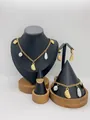 Elegant gold-plated stainless steel jewelry set featuring pearls and textured charms - Wave Pendant Artificial Pearl Style (LX010044)