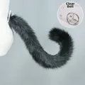 Dettaglio della coda di animale in ecopelliccia nera con cintura trasparente regolabile - Coda di gatto brinato - Nero