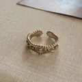 Detail view of a French vintage coffee gold cross open ring with intricate filigree - A39 (coffee Gold)