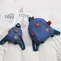 Zaini per bambini a tema papera blu in due dimensioni per scuola e viaggio. - Piccolo / Blu