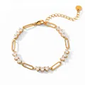 Detailed view of gold-plated titanium steel bracelet with heart-shaped white gems - Triple Heart Style