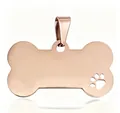 Rose gold bone shaped stainless steel pet ID tag with hollow paw print detail - Rose Gold