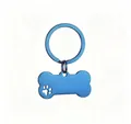 Durable blue bone-shaped stainless steel pet ID tag with a hollow paw print design - Blue (with Ring)