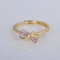 Elegante anillo ajustable de oro con un diseño de lazo de cristal rosa - Abierto Ajustable / Estilo de Gema Rosa con Lazo (YXY-FJTR(4))