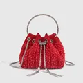 Red pearl and rhinestone evening bucket bag with silver chain strap and tassel detail - Pearl Style / Red