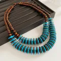 Bohemian ethnic double-strand necklace featuring brown wood beads and turquoise discs. - Necklace-Blue-Brown