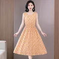 Pink sleeveless midi dress featuring yellow pineapple print and cinched waist design. - Pink Orange Pineapple Print (F24)