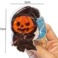 Halloween pumpkin grim reaper cartoon hair clip, 5cm x 7cm size shown held by hand - Pumpkin Reaper