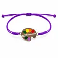 Handmade woven purple wax thread bracelet featuring a colorful artist palette charm - Purple