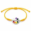 Handwoven yellow wax cord bracelet with colorful artist palette charm - Gold