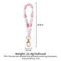 Pink and white macrame woven phone strap with gold clasp, 18.8cm length - Pink & White