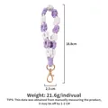 Handmade purple and white macrame daisy flower phone strap with gold lobster clasp - Purple White
