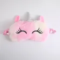 Adorable plush unicorn sleep mask featuring pink gradient fur and glittery silver horn - Curled Lashes Colorful Pink
