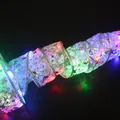Multicolor LED ribbon string lights with gold star patterns for festive holiday decor - 5cm Width - 2m 20 LEDs - 2AA Battery Case / Silver Ribbon - Multicolor