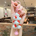 Cute Sanrio Hello Kitty stackable 3D character keychain with pink bell charm for keys. - 00000 Sanrio Jenga - Hello Kitty Pink