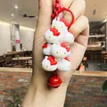 Detailed view of Sanrio Hello Kitty stackable keychain with a vibrant red bell accessory - 00000 Sanrio Jenga - Kt Cat Red