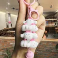 Adorable Sanrio Cinnamoroll stackable figurine keychain with pink lobster clasp and bell - 00000 Sanrio Jenga - Cinnamon Dog Pink