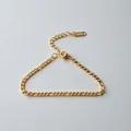 Detail van goudkleurige roestvrijstalen Cubaanse schakelarmband - NK Fijne Ketting (ne269nk) / Goud