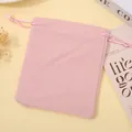 Zachte roze fluwelen opbergtas met trekkoord voor sieraden, geschenken en accessoires - Roze; 5*7cm