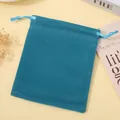 Premium teal velvet drawstring jewelry pouch for elegant storage and gift packaging - Lake Blue; 5*7cm