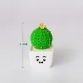 Miniatuur groene hars cactus in witte pot met een schattig cartoon gezicht, 3.8 cm hoog - Letter O-vorm (opp-zak)