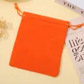 Bright orange velvet drawstring bag perfect for jewelry storage and gift packaging - Orange; 5*7cm
