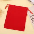 Vibrant red velvet drawstring jewelry pouch with a smooth texture for gift storage - Red; 5*7cm