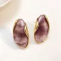 Elegant irregular purple resin stud earrings with gold-toned metal edge for women - Light Purple
