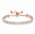 Close-up detail of 4mm round white zircon stones on a rose gold adjustable tennis bracelet - June Moonstone White