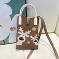 Brown knitted mini tote bag for women with white reindeer pattern and top handles - Silicone Phone Case #12