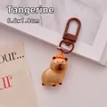 Cute resin Capybara keychain with orange decoration, stylish bag charm and gift - Orange