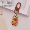 Cute resin Capybara keychain with turtle variant for bag and backpack decoration - Turtle