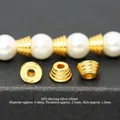 Close-up of S925 gold-plated saucer spacer beads for DIY jewelry with dimensions - Spiral Tower 4.5mm Spacer (JHF63422)