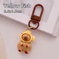 Adorable capybara resin keychain featuring a yellow fish hat design charm for bags - Yellow Fish