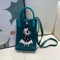 Elegant teal knitted phone bag featuring cartoon girl embroidery and shoulder strap - Silicone Phone Case #17