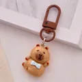 Cute resin capybara keychain with blue bowtie pendant for bag and key decoration - Bow Tie