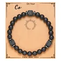 Handmade matte black beaded bracelet featuring square lava stones on a kraft display card - Confirmation Card (Confirmation Card + Black Matte Lava Stone Bracelet)
