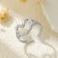 Minimalistischer silberner Edelstahlring mit unregelmäßiger Herzform, offen - Gj043 - Stahlfarbe