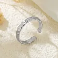 Eleganter verstellbarer offener Ring aus silbernem Edelstahl mit Wellenmuster für Damen - Gj066 - Stahlfarbe