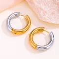 Macro detail of minimalist two-tone 18K gold and silver titanium steel hoop earrings - Round / 8mm / Gold and Silver Two-tone