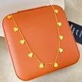 Elegante collana in acciaio al titanio placcato oro 18k con ciondoli a cuore multipli - Oro (Collana 11 Cuori)